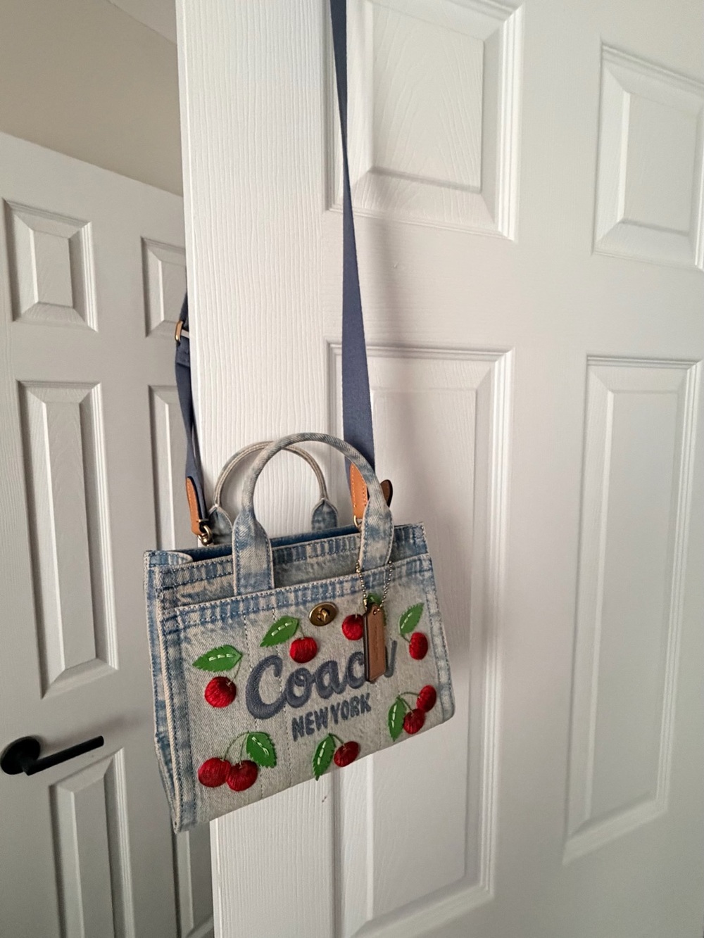 Coach Denim Cherry Crossbody Bag in Light Blue with Red Accents